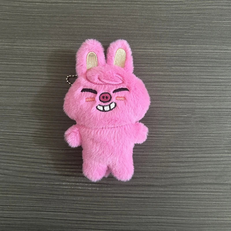 Charmoji Sassyboo – pink bunny plush keychain with confident sassy smile, expressive kawaii charm for bags