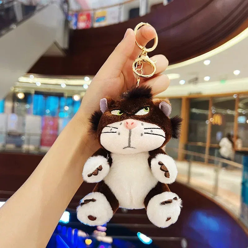 Close-up of fluffy grumpy cat plush keychains with keyring attachment