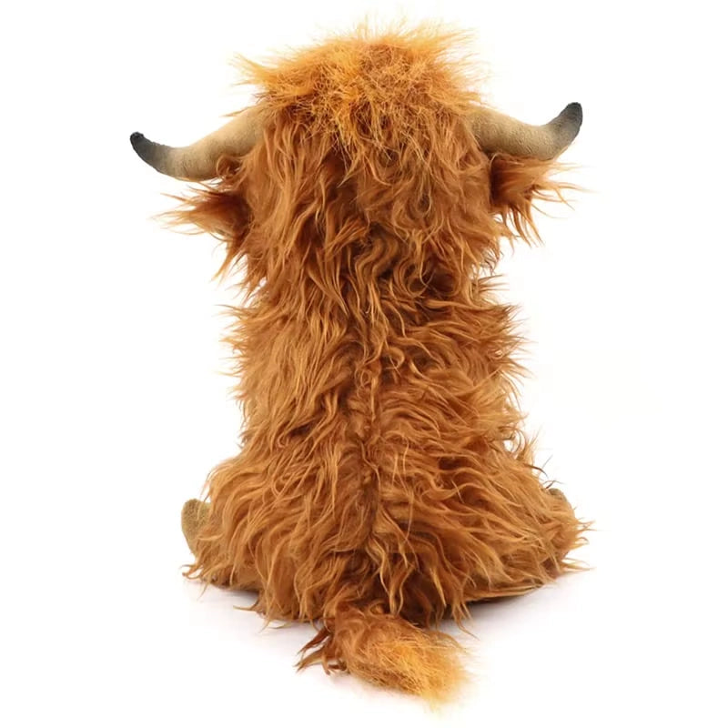 alt="Soft and cuddly Highland Cow plush toy, perfect as a cute stuffed animal gift for kids, collectors, or anyone who loves rustic charm"