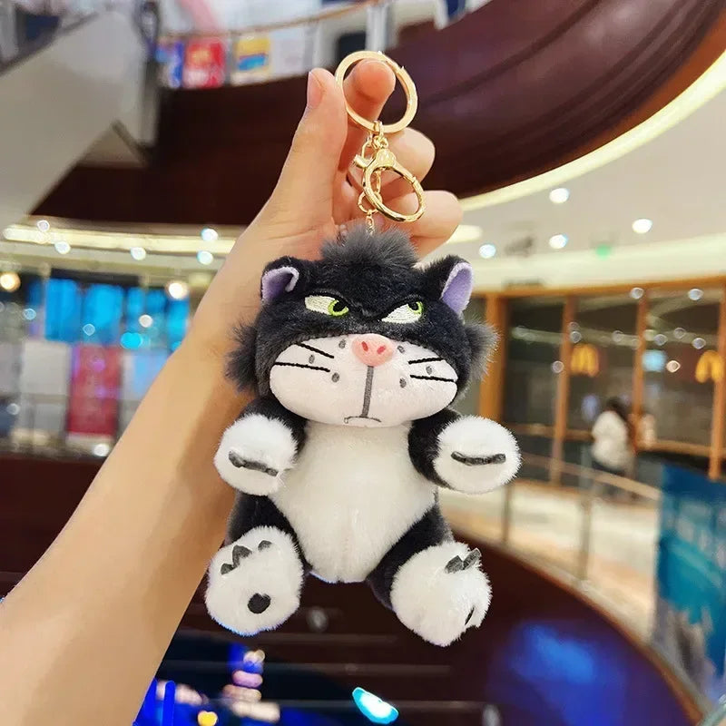 Mr. Grumps plush cat keychains hanging from a gold keychain ring