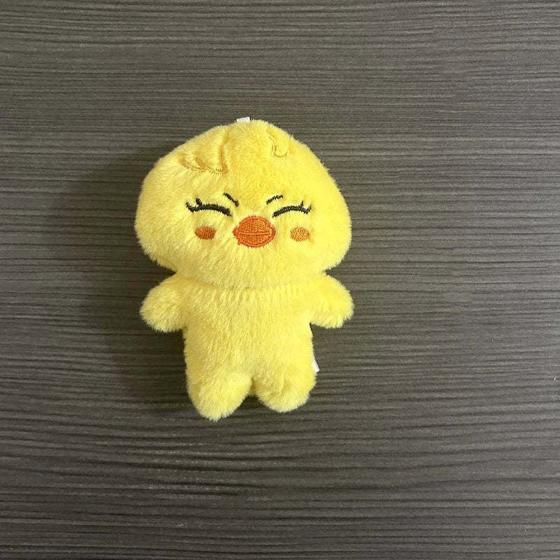 Charmoji Smilo – happy yellow duck plush keychain with smiling face, cute kawaii soft toy charm