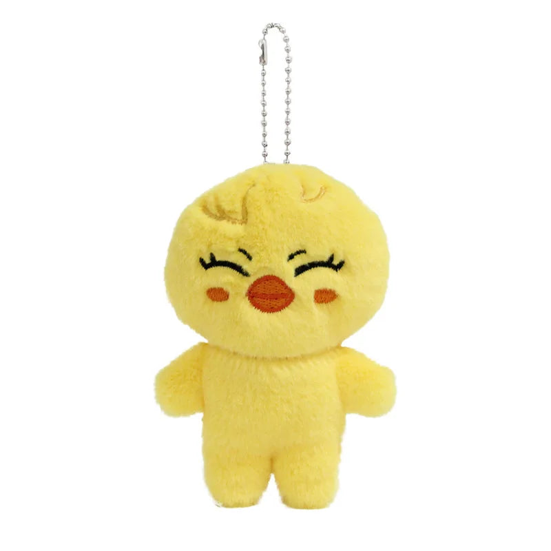 Charmoji Smilo – happy yellow duck plush keychain with smiling face, cute kawaii soft toy charm