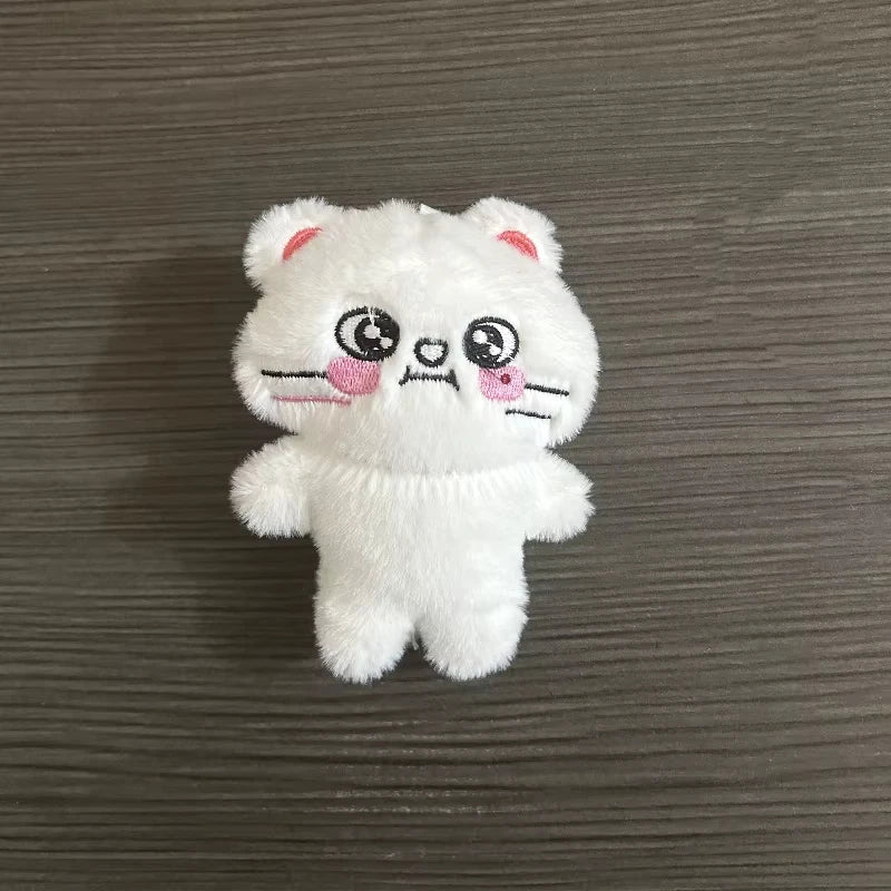 Charmoji Swirlo– white plush keychain with spiral eyes, dazed expression, cute kawaii mood plush charm